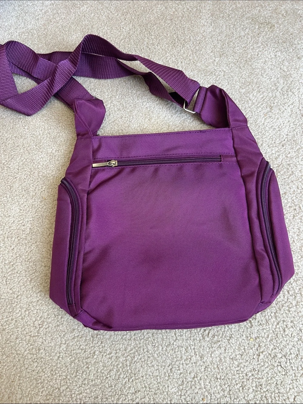 Compact Purple Crossbody Bag with Triple Front Zips